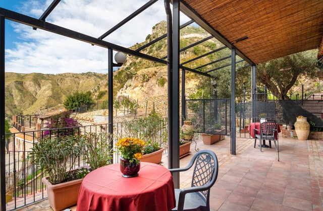 Holiday Apartment 'Garden Cottage I Dammusi - Ulivo' with Mountain View, Shared Pool & Wi-Fi