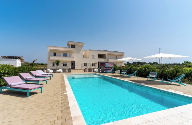 Holiday Apartment "Le Scuderie 10" with Balcony, Shared Pool & Wi-Fi