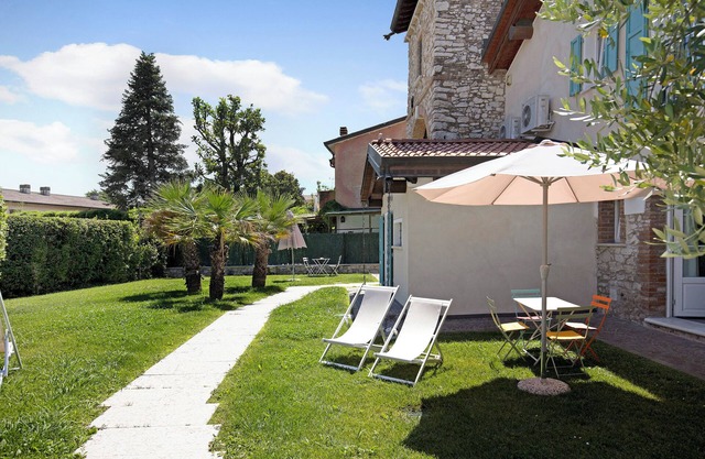 Holiday Apartment "Ligustro" with Private Terrace, Shared Garden & Pool