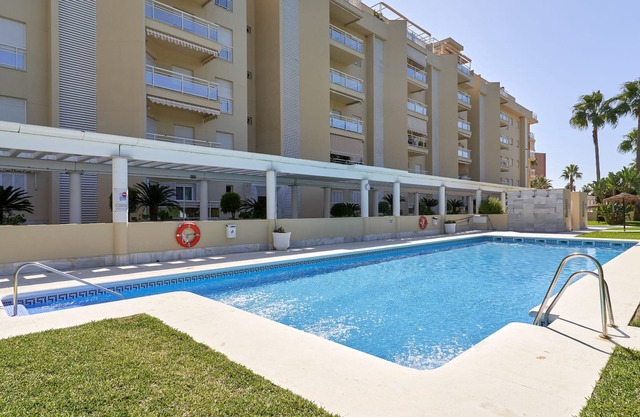 Holiday Apartment "Luxury On The Beachfront" near beach with Shared Pool & Wi-Fi