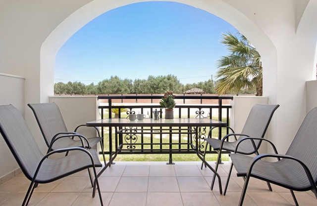 Holiday Apartment "Tropical Studio 2" with Shared Garden, A/C & Wi-Fi