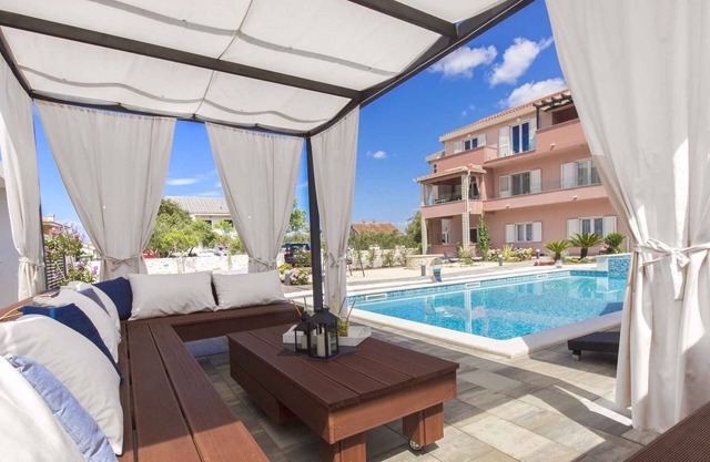 Holiday apartment with terrace and pool