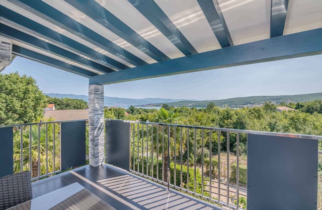 Holiday apartment with air conditioning and balcony