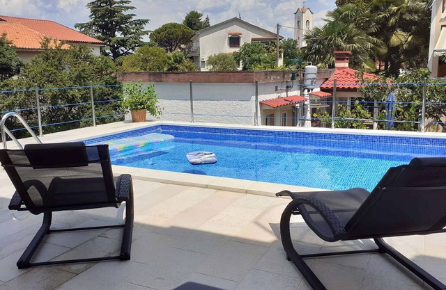 Holiday apartment with pool