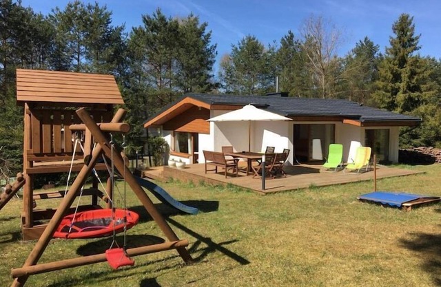 Holiday Home by Lake with Sandy Beach