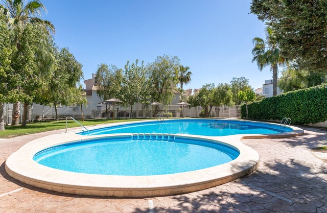 Holiday Home 'Casa en la Playa con Piscinas V' with Shared Pool and Air Conditioning