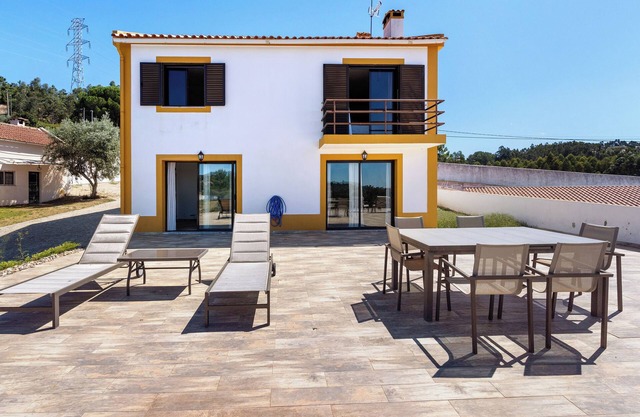 Holiday home 'Casa Girassol' with shared pool, private terrace, and Wi-Fi access