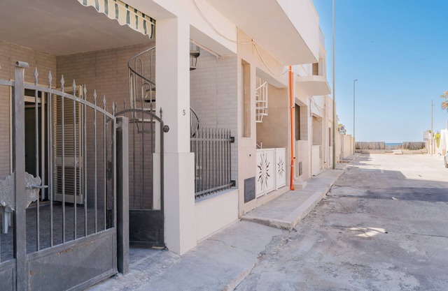 Holiday Home 'Casa Augusto' with Sea View, Private Garden and Air Conditioning