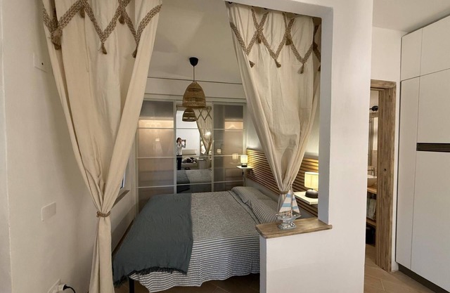Holiday Home 'Le Vele' with Shared Pool, Private Garden and Air Conditioning