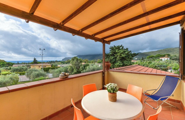 Holiday Home 'Trilocale Lavanda A Lacona' with Sea View, Shared Pool and Wi-Fi