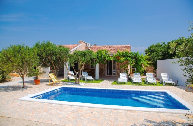Holiday house Novalja for 1 - 10 persons with 4 bedrooms - Holiday house