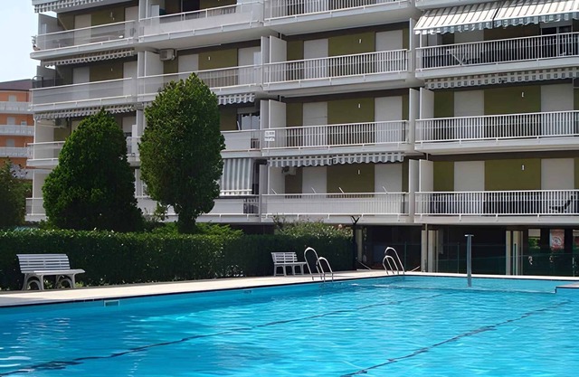 Holiday apartment Apartment with swimming pool surrounded by a garden