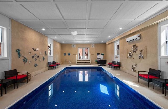 Hot Tub, Views, Game Room & Pool in this 8BR Mountain Cabin