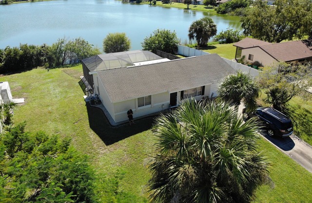 House with solar heated pool and lake view!