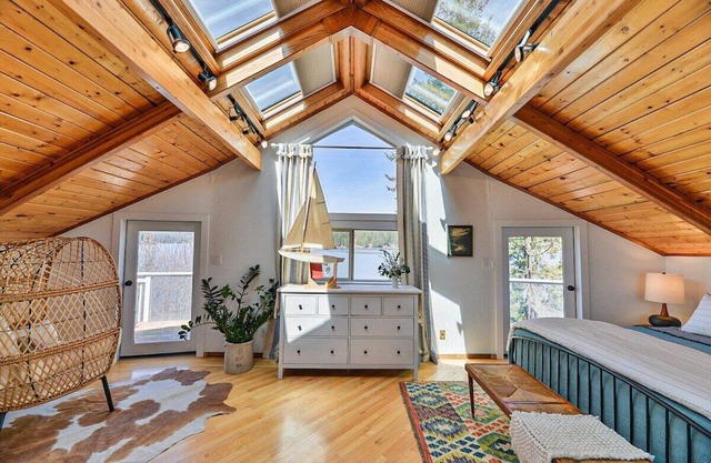 Huvila Haven Lake Front Home with Dock and Hot Tub