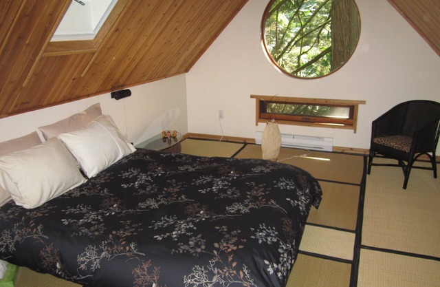 Japanese style Forest House on 6 acres offers hot tub, unique beauty and quiet.
