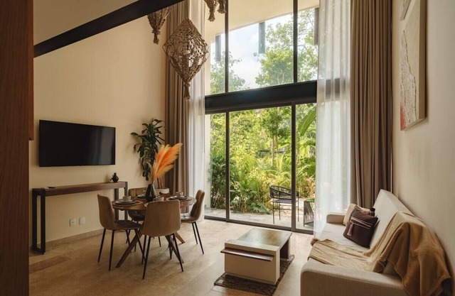 Jungle Condo with Pools, Gym, and Rooftop Terrace
