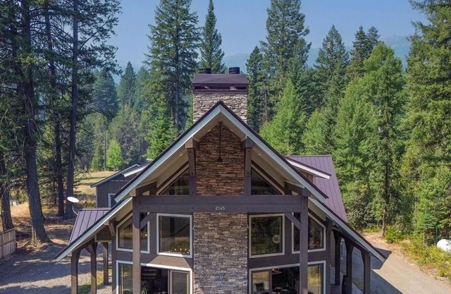 Knotty Pines in Donnelly | Luxe Cabin Bordering Tamarack | Room for Toys | Hot Tub
