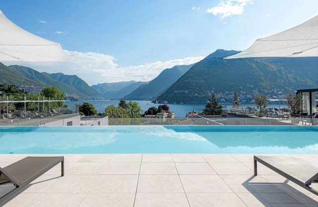 Lake Como Escape: Luxurious Spa and Rooftop Pool, Close to Brunate Funicular!