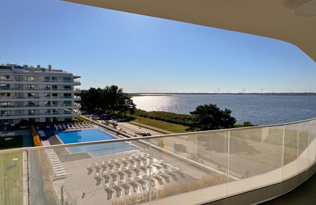 Lake pool view with private beach access Garage