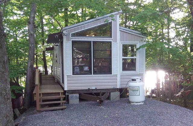 Lakefront 1BR cabin with boat and private dock, beaches, and fishing