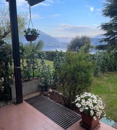 Lallas Home with garden and lake view
