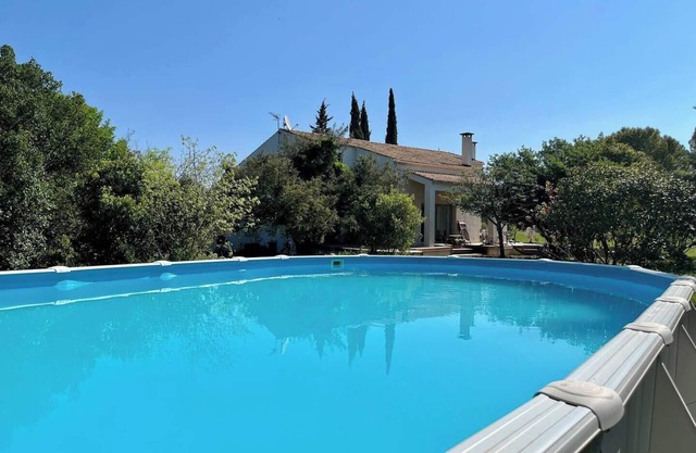 Large family home with swimming pool and air conditioning, suitable for children.