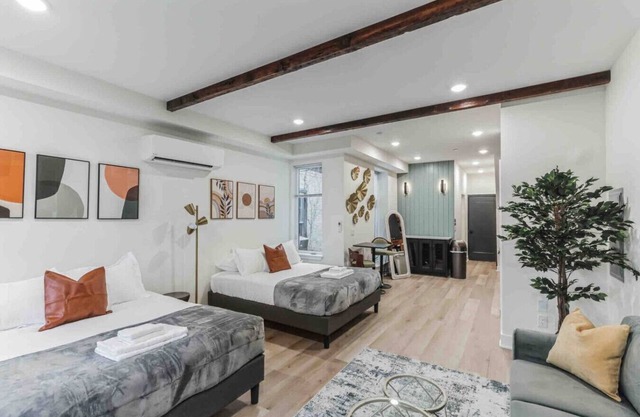Large Studio w/2 Beds & Balcony (C)