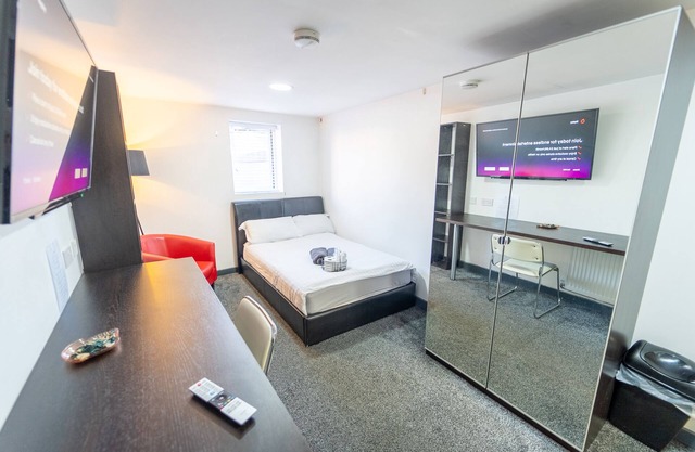 Large top floor studio close to QE!