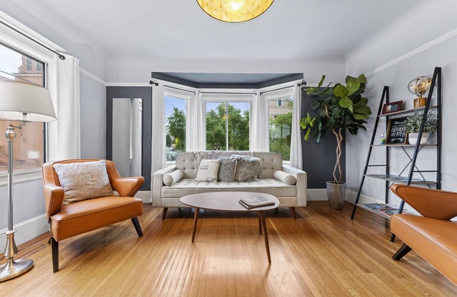 Living Room, 2 Queen Beds & 2 Baths.