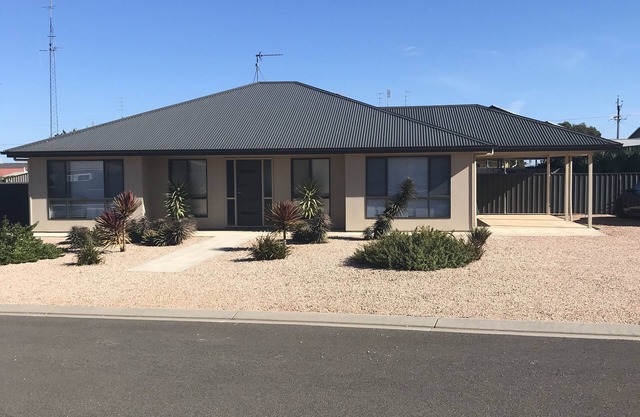 Located within walking distance to Beautiful Simms Cove in a quiet Cul-de-Sac