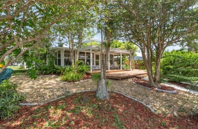 Long-Term Discount!Unique 3BR canal home, Private Dock, Boat Lift, Deck!