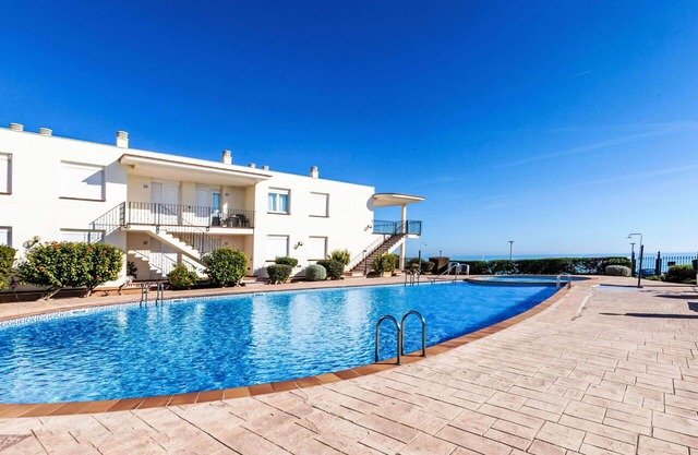 Lovely apartment for 4 people with WIFI, pool, TV and terrace