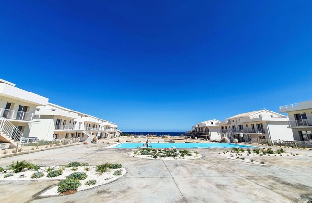 Lovely apartment for 4 people with A/C, pool, WIFI, TV and terrace