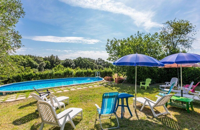 Lovely apartment in villa for 12 guests with WIFI, private pool, TV, patio and pets allowed