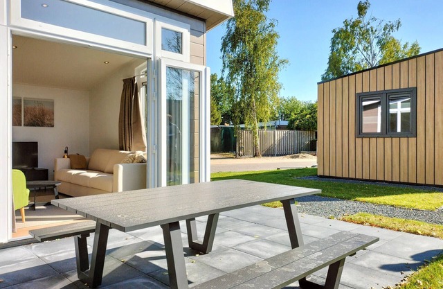Lovely home in Heinkenszand with heated swimming pool