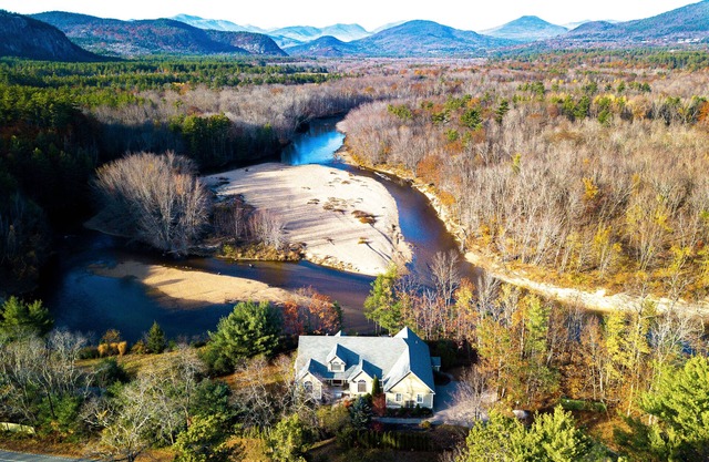 Lovely home with water view, hot tub, fireplace, & washer/dryer