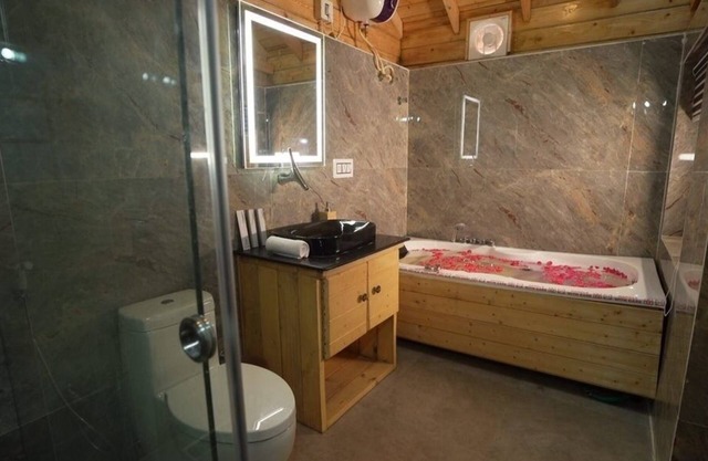 Lovely Wooden Cottage KPHB - A Dreamy Getaway with Nature, Wood, and a Jacuzzi.