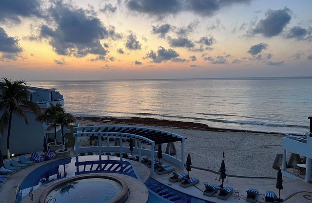 Luxury oceanfront condo near charming Playa del Carmen with WiFi
