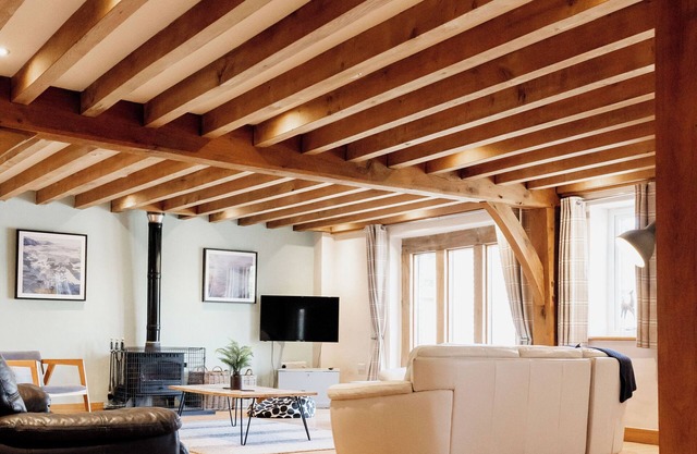 Luxury renovated barn with a large hot tub and games room. Sleeping 16