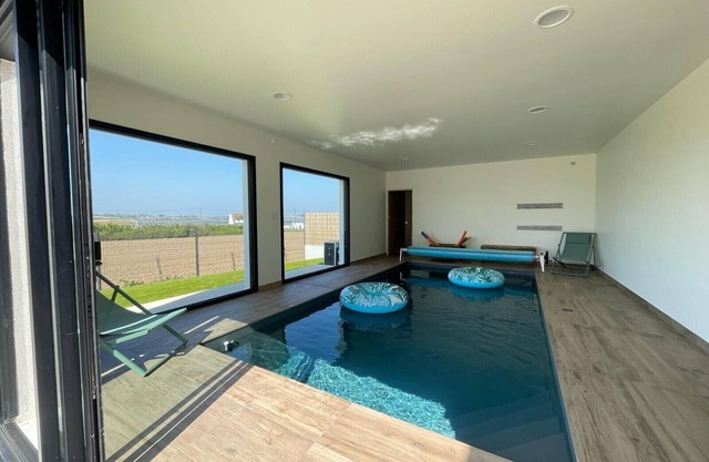 Magnifique maison avec piscine couverte