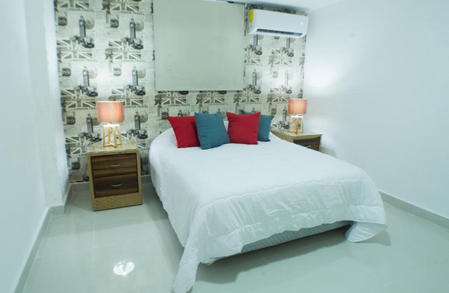 Malecon Rooms y Hotel