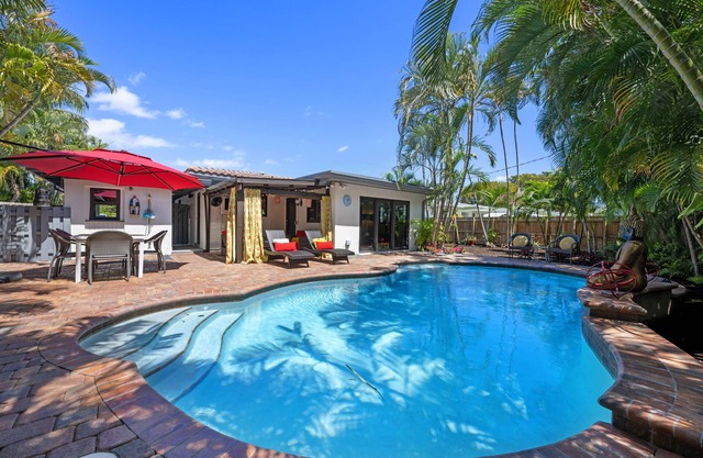 Martini Manor is the ultimate Tropical Oasis with a private Heated Pool!