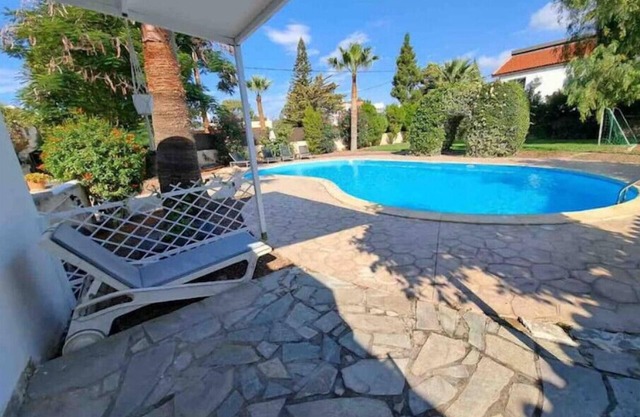 Mediterranean Poolside Garden Cottage