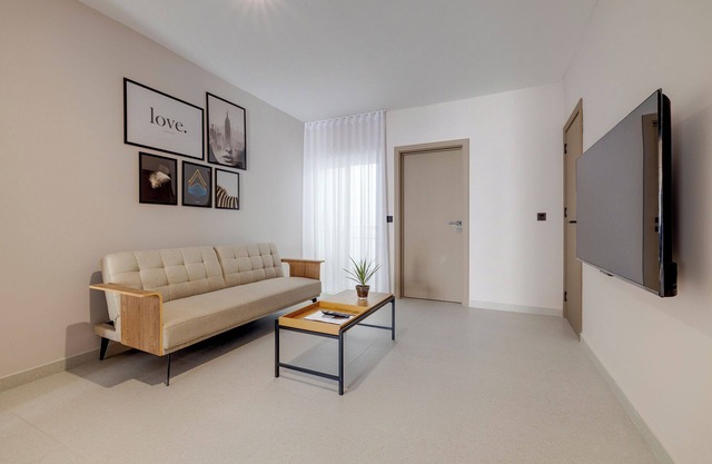 Modern 2BR Oasis Steps from the Promenade