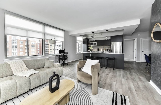 Modern 2BR Oasis with Scenic Rooftop & Gym ﻿