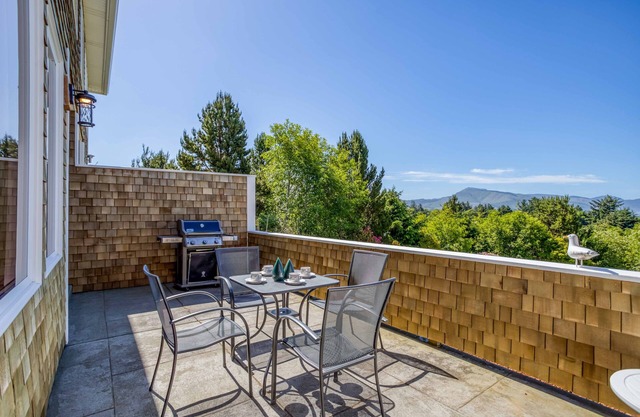 Modern Beauty on Private Street has Netarts Bay, Ocean Views, Putting Green!