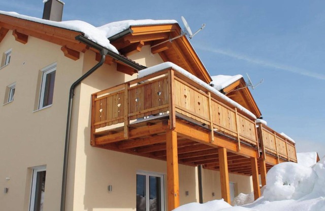 Modern chalet near the slopes with a ski storage