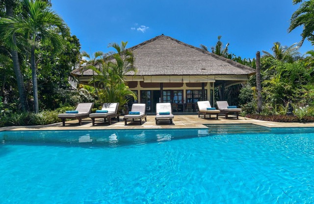 Modern, Luxury and Spacious Beach front Villa with Private Pool & Staff