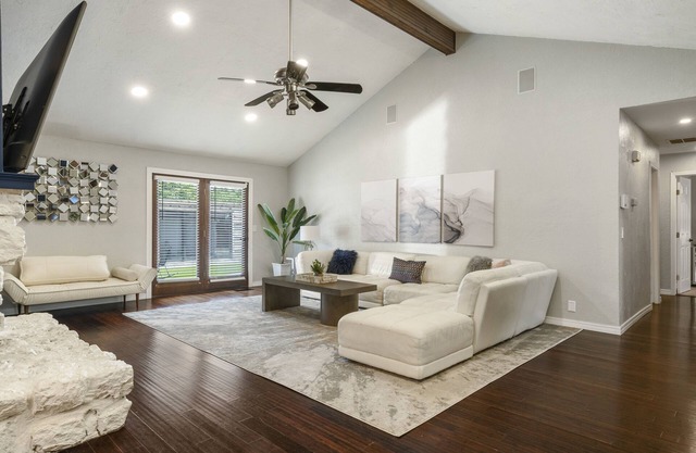 Modern space in south Tulsa w/outdoor firepit, kitchen, turf, & string lights!